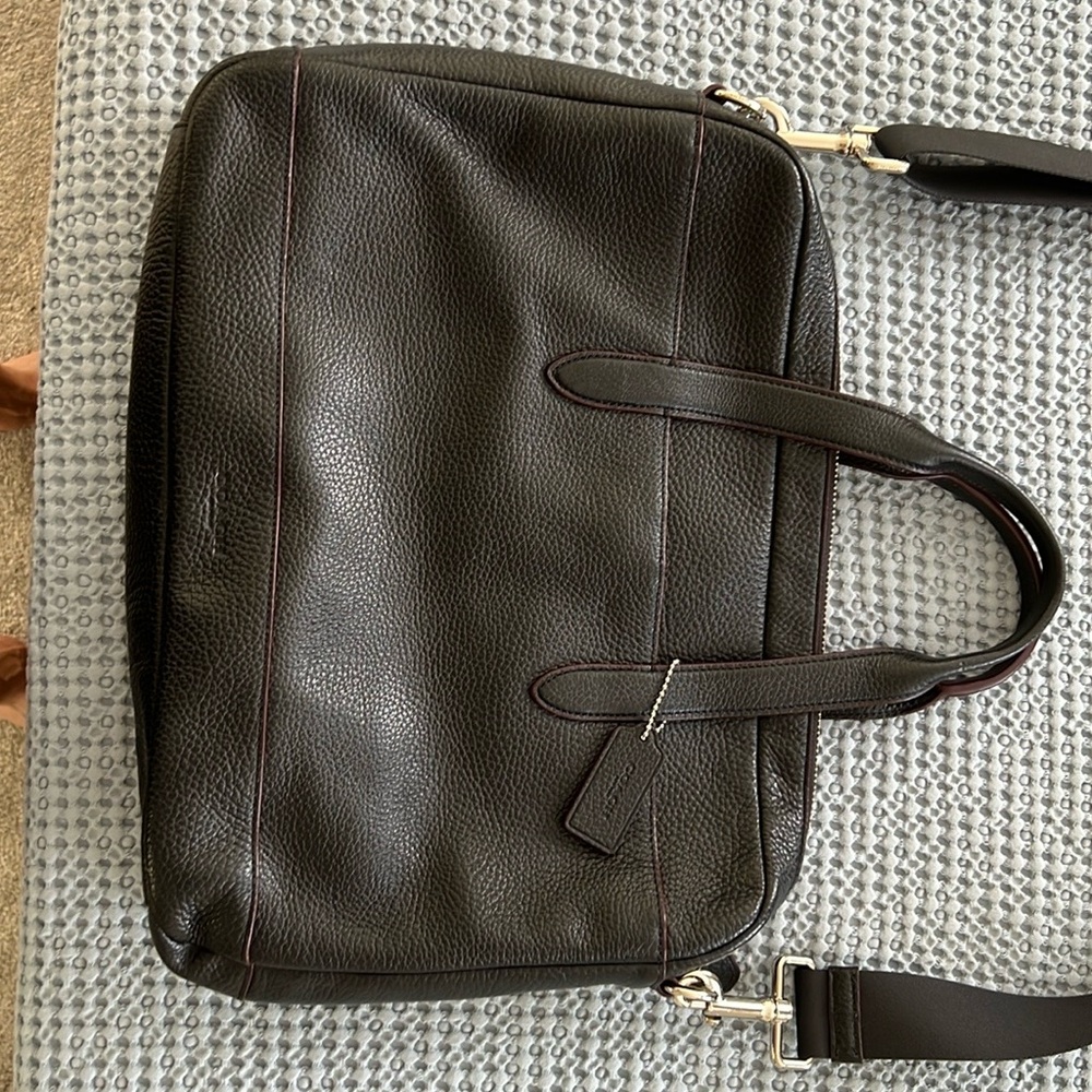 Unisex brown/oxblood laptop bag. Never used, excellent condition